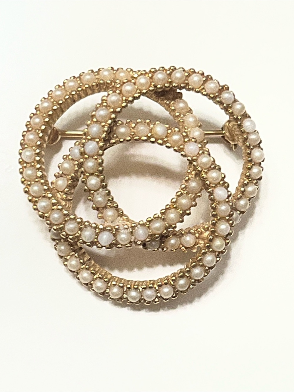 Signed Ciner Gold-tone Antique Love Knot/Concentric Circle Faux Pearl Brooch